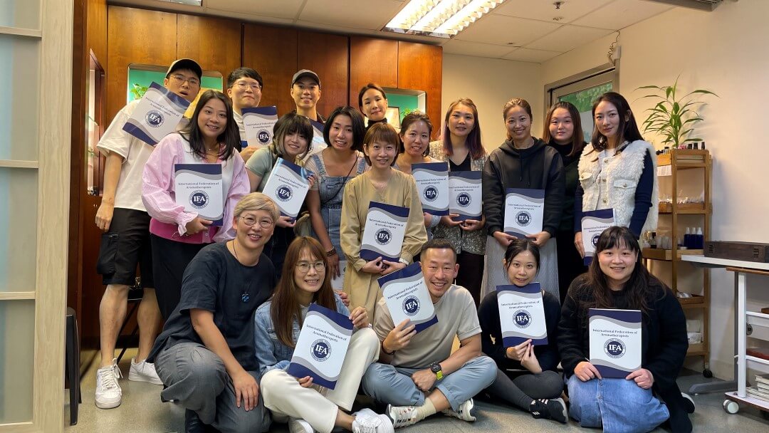 JGO Holistic Aromatherapy & Health School's fresh graduate taking group photo with their IFA (International Federation of Aromatherapists) diploma certificate